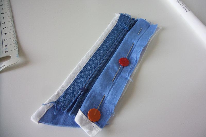 Zipper pinned to front fly extension