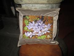 Embroidered pillow with spring flowers design
