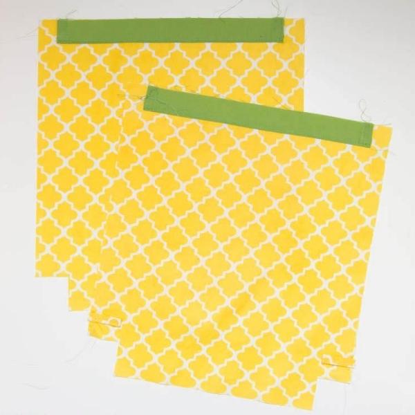 White and yellow fabric with green edging