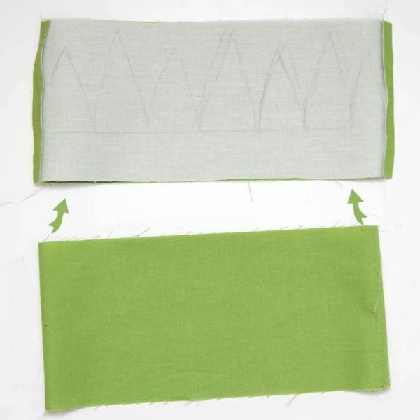 Green and white rectangular pieces of fabric