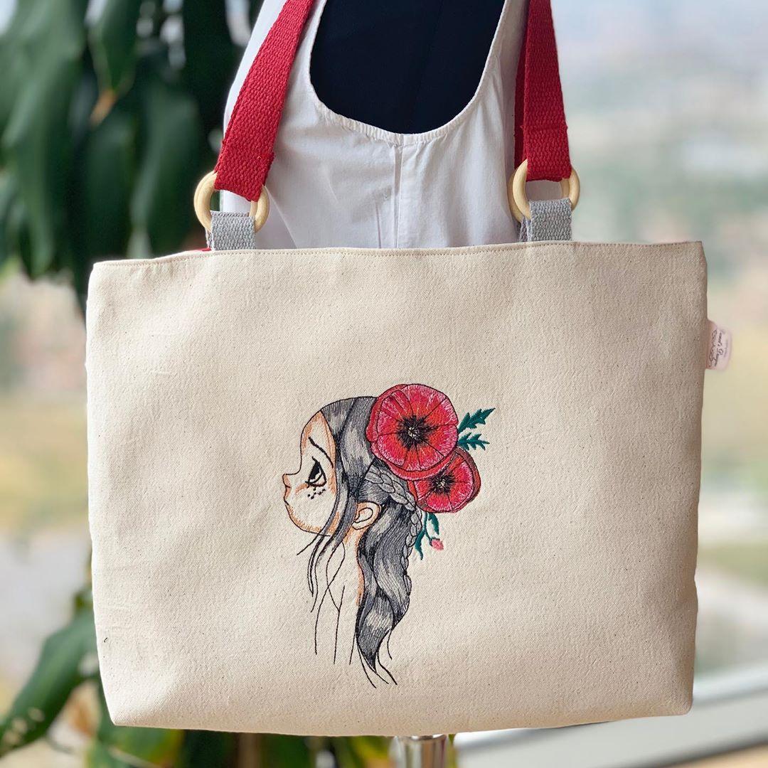 Girl with Poppies Embroidery Design: Canvas of Charming Elegance