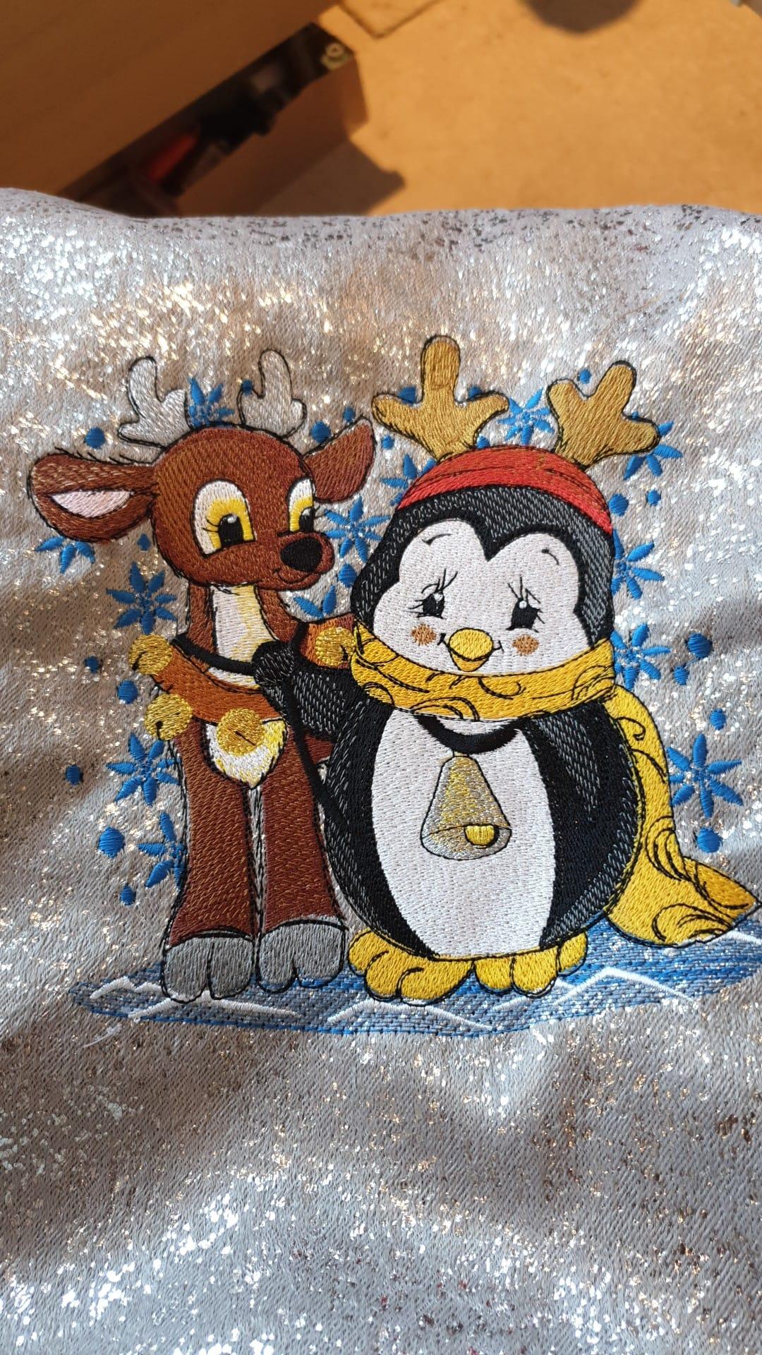 Funny penguin and deer embroidery design