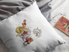 Embroidered cushion with Christmas gift design