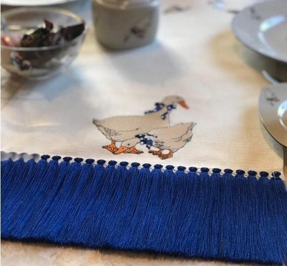 Embroidered table cloth with goose free design