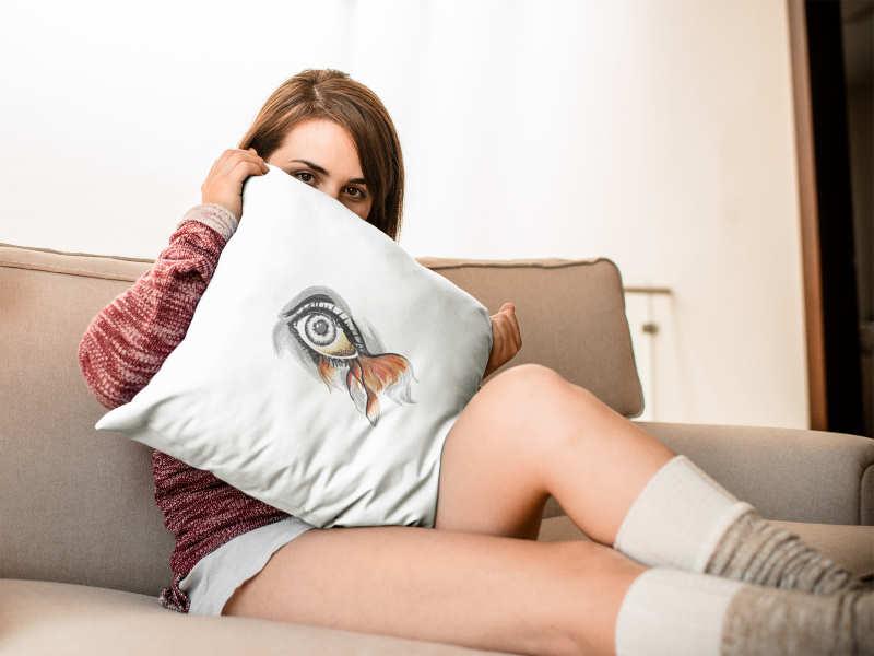 Embroidered cushion with Fish eye design