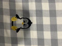 Adorable Alert: Transform Your Napkins with This Free Penguin Embroidery Design