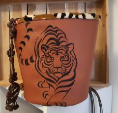 Tribal-Inspired Leather Basket with Single-Color Tiger Embroidery: A Bold and Exotic Decorative Storage Solution