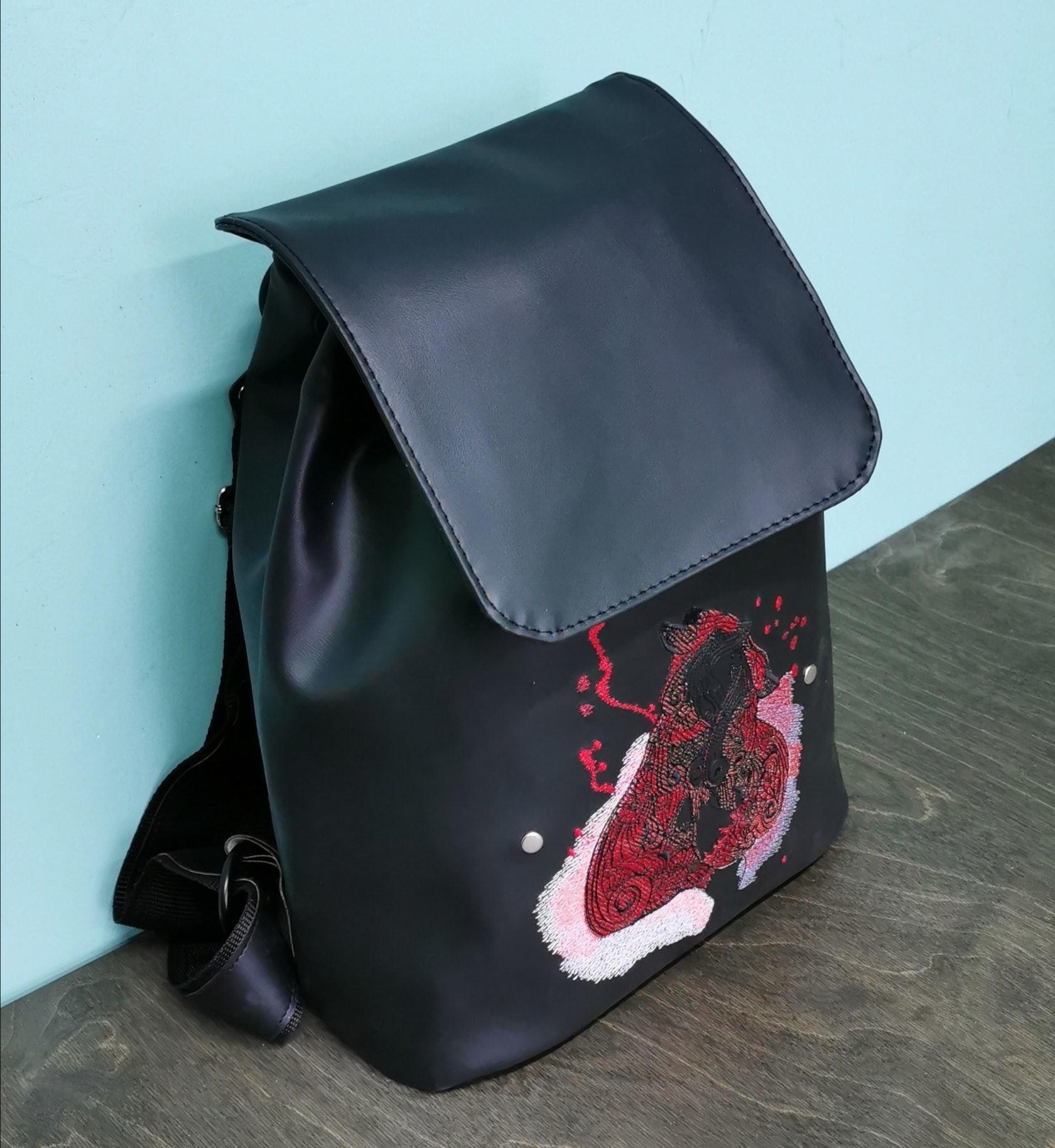 Fox Family Embroidery: Elevating Leather Backpacks to Art