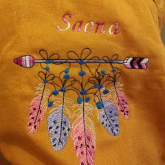 Stitching Native American Traditions Arrow and Feather embroidery