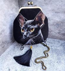Stitch Elegance: Sphynx Cat on Black Embroider a Mystical Design