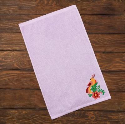 Towel_with_bird_and_flower_free_embroidery_design.jpg