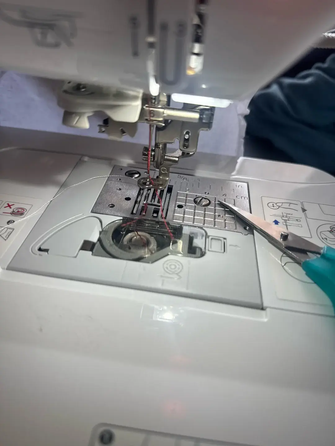 Embroidery machine bobbin area